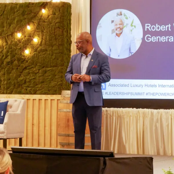 Speaker giving a presentation on stage