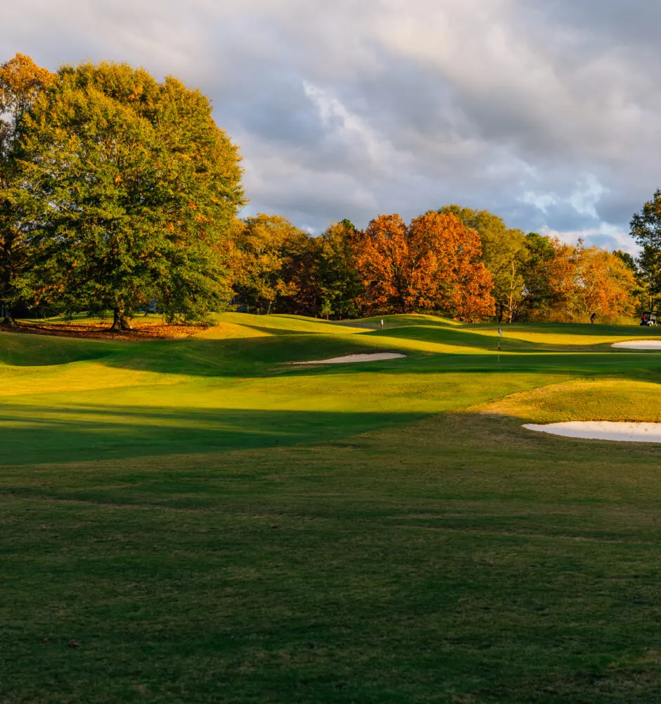 Scenic golf course with trees in autumn colors
